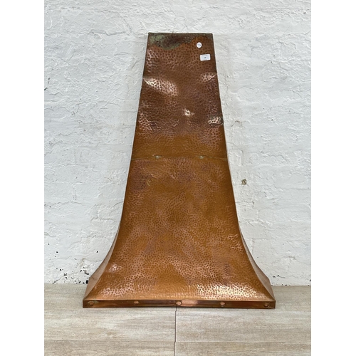 16 - A Raymond Hodgkiss & Company handmade copper fire canopy - approx. 115cm high