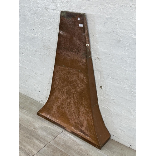 16 - A Raymond Hodgkiss & Company handmade copper fire canopy - approx. 115cm high