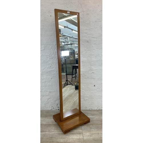 162 - An oak framed cheval mirror - approx. 176cm high x 50cm wide x 42cm deep