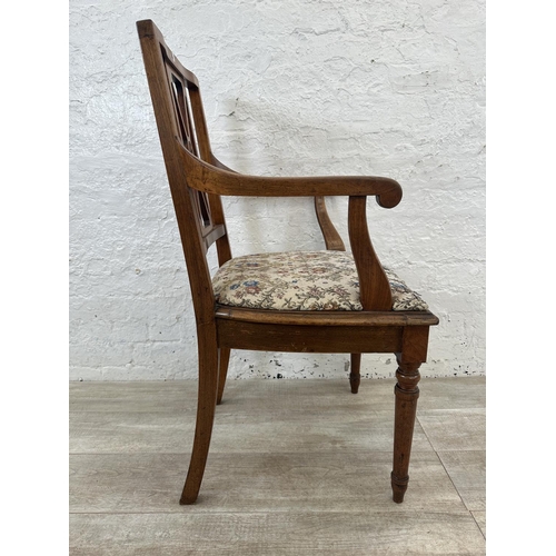 164 - An Edwardian carved walnut and tapestry upholstered open armchair - approx. 97cm high x 54cm wide x ... 