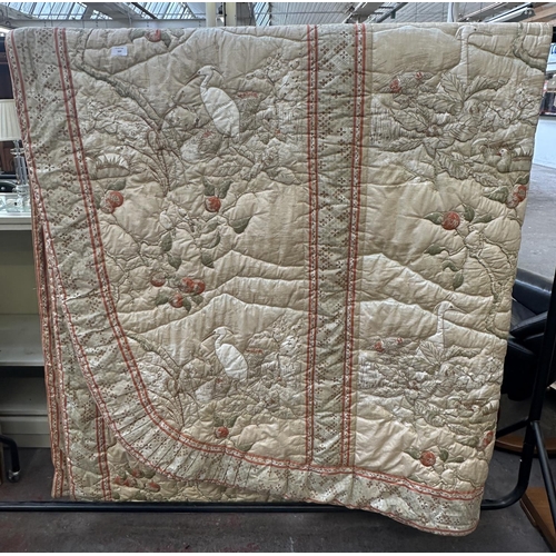 167 - An Oriental style quilted bed throw - approx. 295cm x 190cm