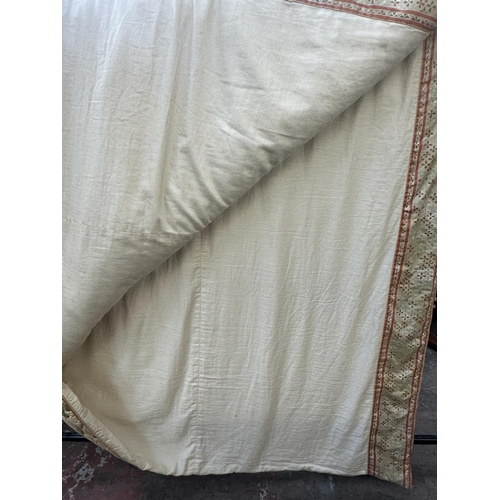 167 - An Oriental style quilted bed throw - approx. 295cm x 190cm