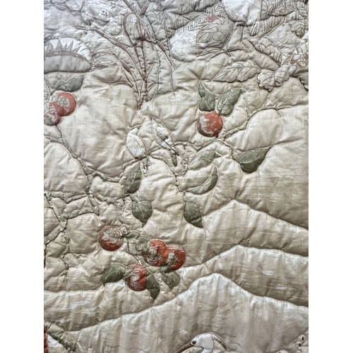 167 - An Oriental style quilted bed throw - approx. 295cm x 190cm