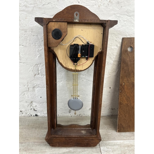 17 - Three wall clocks, one early 20th century mahogany cased chiming with key and pendulum, one Emperor ... 