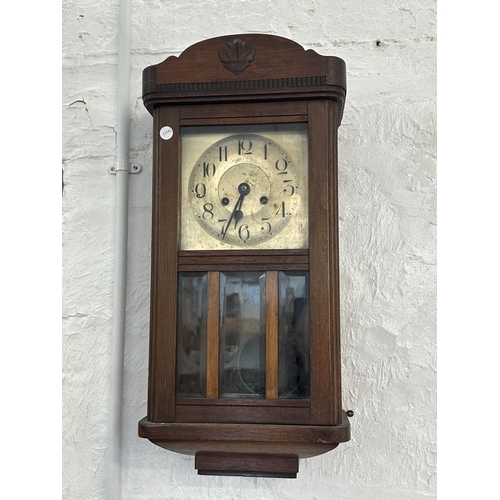 17 - Three wall clocks, one early 20th century mahogany cased chiming with key and pendulum, one Emperor ... 