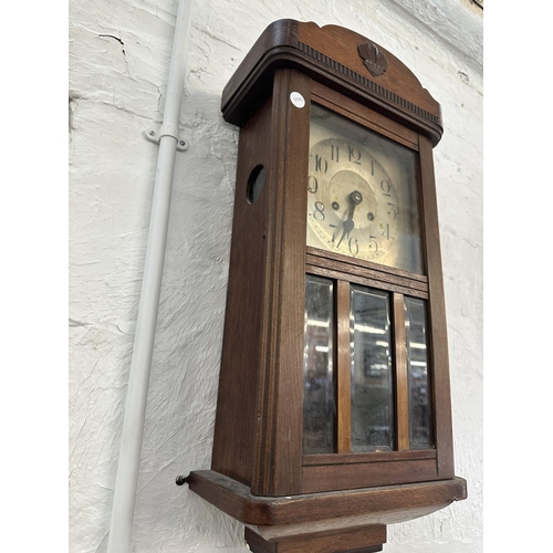 17 - Three wall clocks, one early 20th century mahogany cased chiming with key and pendulum, one Emperor ... 