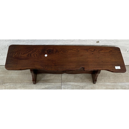 2 - A carved elm bench - approx. 49cm high x 22cm wide x 91cm long