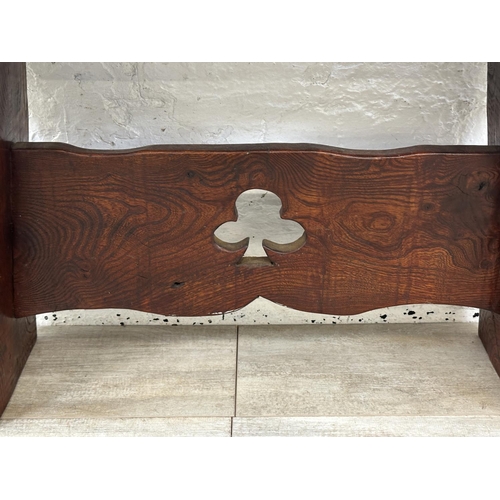 2 - A carved elm bench - approx. 49cm high x 22cm wide x 91cm long