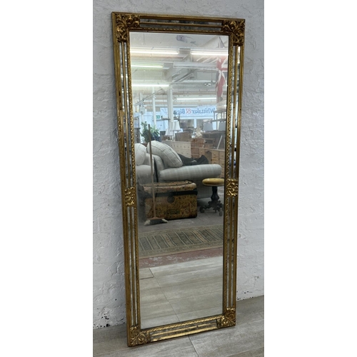 20 - A 19th century style gilt framed wall mirror - approx. 163cm x 63cm