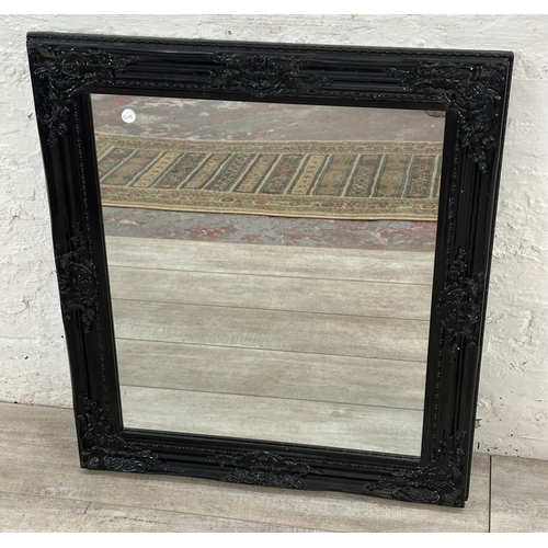 21 - Two 19th century style framed wall mirrors - largest approx. 75cm x 63cm