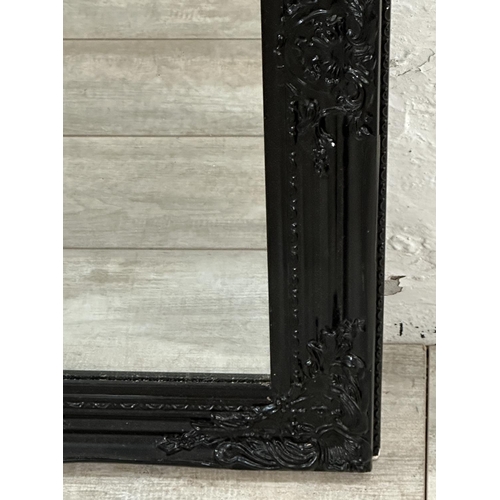 21 - Two 19th century style framed wall mirrors - largest approx. 75cm x 63cm