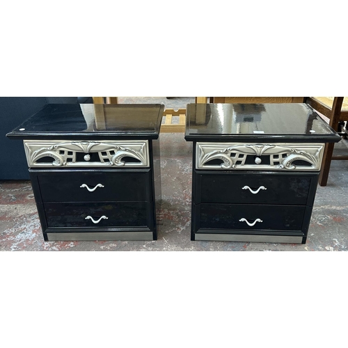 225 - A pair of modern black and silver lacquered bedside chests of drawers - approx. 55cm high x 58cm wid... 