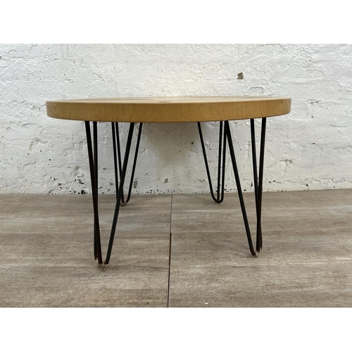 229 - A modern beech and epoxy resin circular coffee table on metal hairpin supports - approx. 44cm high x... 