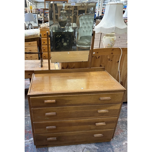 231 - A mid 20th century oak dressing chest - approx. 146cm high including mirror x 91cm wide x 46cm deep