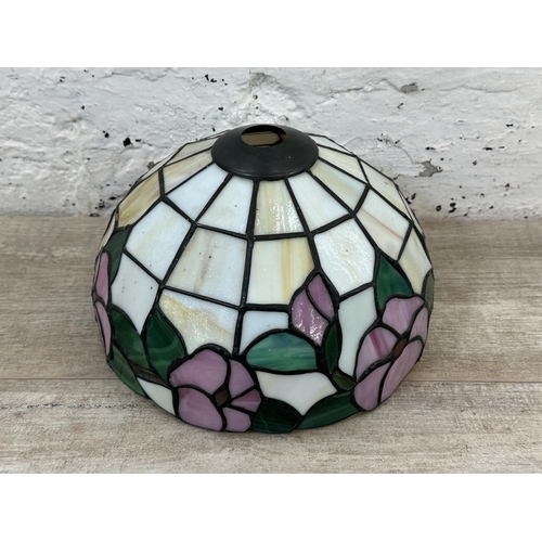 232 - A Tiffany style stained glass lamp shade - approx. 25cm diameter