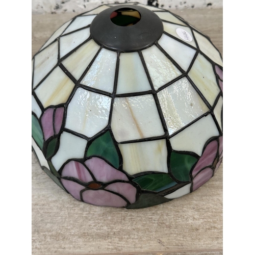 232 - A Tiffany style stained glass lamp shade - approx. 25cm diameter