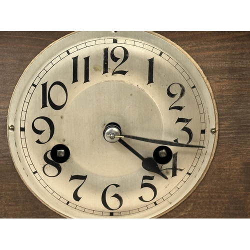 233 - A late 19th/early 20th century mahogany cased chiming mantel clock with pendulum - approx. 28cm high... 