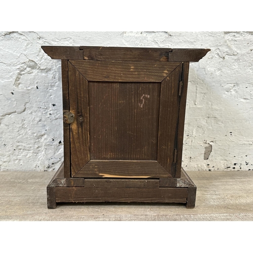 233 - A late 19th/early 20th century mahogany cased chiming mantel clock with pendulum - approx. 28cm high... 