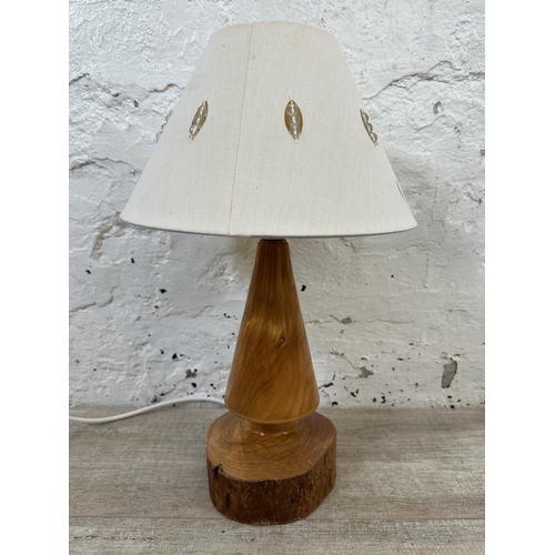 234 - A mid 20th century turned yew wood table lamp - approx. 42cm high including shade