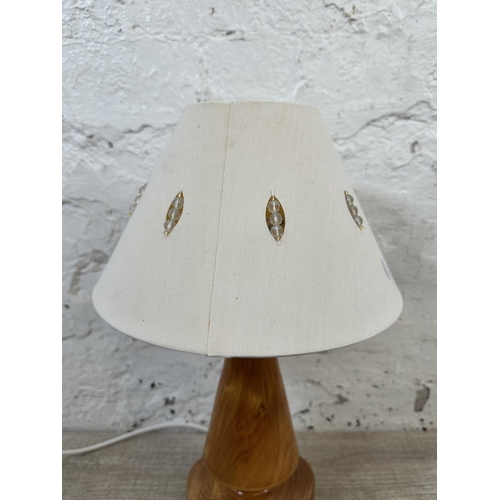 234 - A mid 20th century turned yew wood table lamp - approx. 42cm high including shade