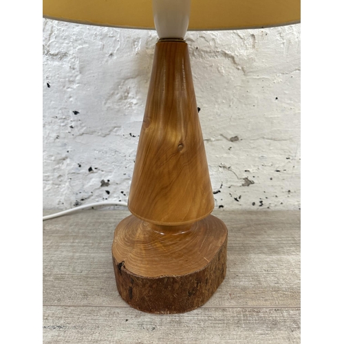 234 - A mid 20th century turned yew wood table lamp - approx. 42cm high including shade