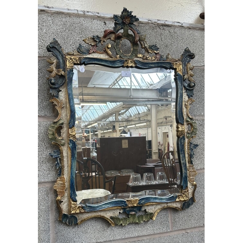 24 - A Rococo style hand painted and gilt carved wood framed bevelled edge wall mirror - approx. 80cm hig... 