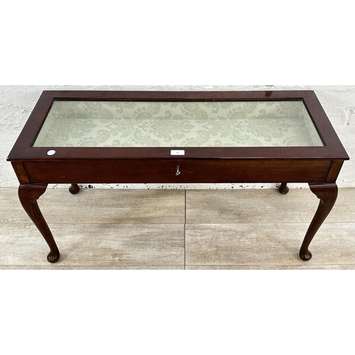 29 - A mahogany bijouterie table - approx. 50cm high x 93cm wide x 36cm deep