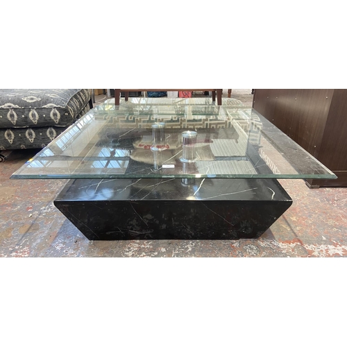 299 - A modern bevelled glass top and marble effect coffee table - approx. 36cm high x 95cm square
