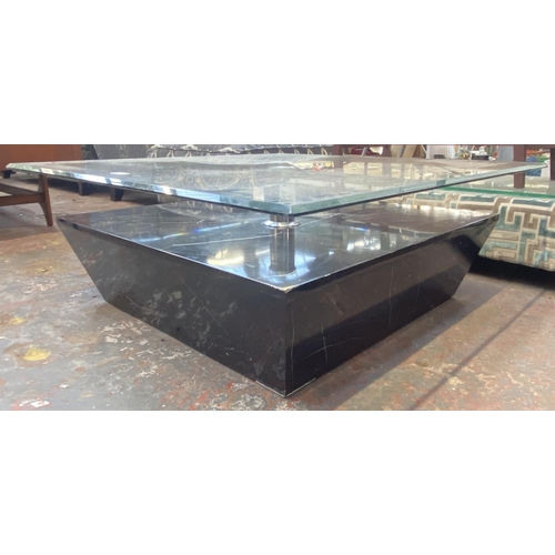299 - A modern bevelled glass top and marble effect coffee table - approx. 36cm high x 95cm square
