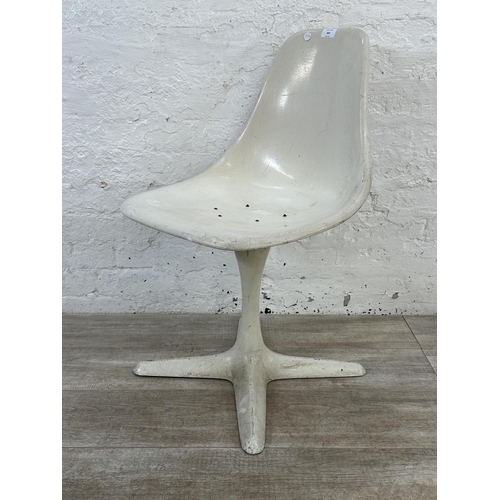 302 - A mid 20th century Maurice Burke for Arkana white moulded plastic swivel Tulip dining chair - approx... 
