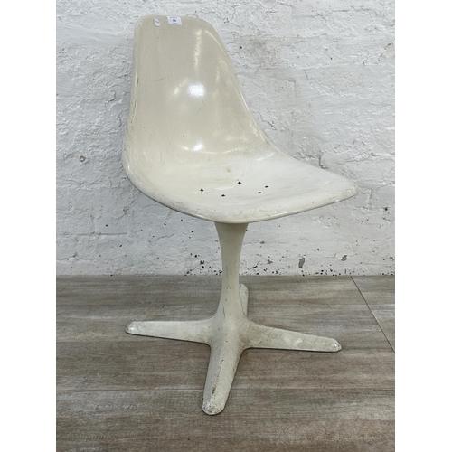 302 - A mid 20th century Maurice Burke for Arkana white moulded plastic swivel Tulip dining chair - approx... 