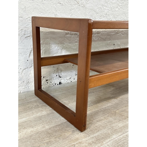 303 - A mid 20th century teak coffee table - approx. 43cm high x 43cm wide x 111cm long
