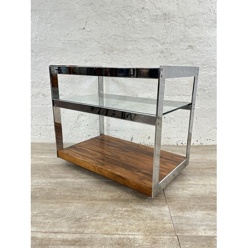 318 - A 1970s Merrow Associates rosewood and chrome plated drinks trolley with glass top, CITES A10 certif... 