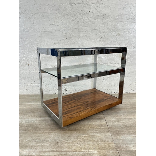 318 - A 1970s Merrow Associates rosewood and chrome plated drinks trolley with glass top, CITES A10 certif... 