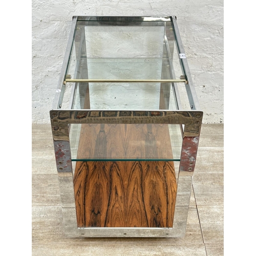 318 - A 1970s Merrow Associates rosewood and chrome plated drinks trolley with glass top, CITES A10 certif... 