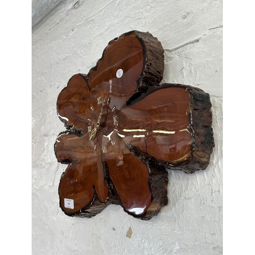 34 - A mid 20th century live edge tree slice quartz wall clock - approx. 40cm diameter