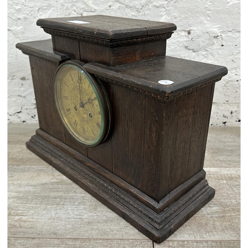 35 - Three mantel clocks, one mid 20th century walnut cased chiming with pendulum, one 1930s walnut cased... 