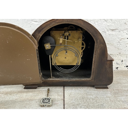 35 - Three mantel clocks, one mid 20th century walnut cased chiming with pendulum, one 1930s walnut cased... 