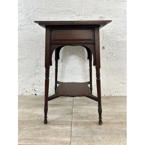 4 - An Edwardian mahogany fold over work table - approx. 66cm high x 76cm wide when extended x 38cm deep