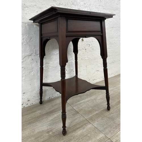 4 - An Edwardian mahogany fold over work table - approx. 66cm high x 76cm wide when extended x 38cm deep