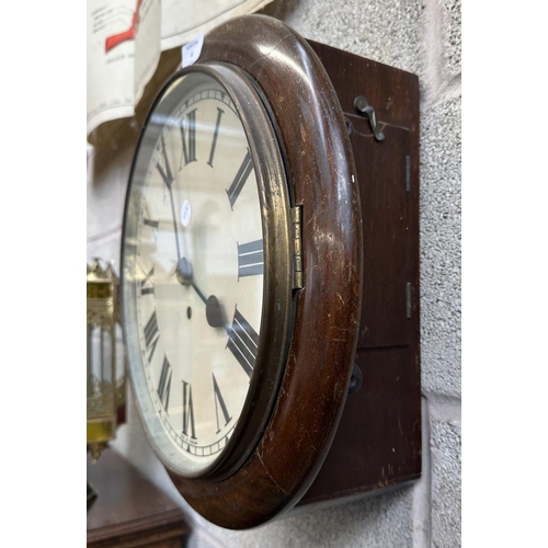 41 - A Victorian mahogany cased key wind circular wall clock - approx. 39cm diameter