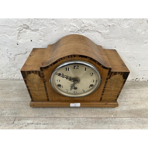 43 - An Art Deco rosewood inlaid walnut cased Westminster chime mantel clock with pendulum and key - appr... 