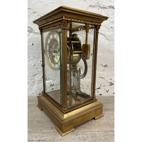 45 - A late 19th century French S. Marti gilt brass four glass mantel clock with enamel face, key and pen... 