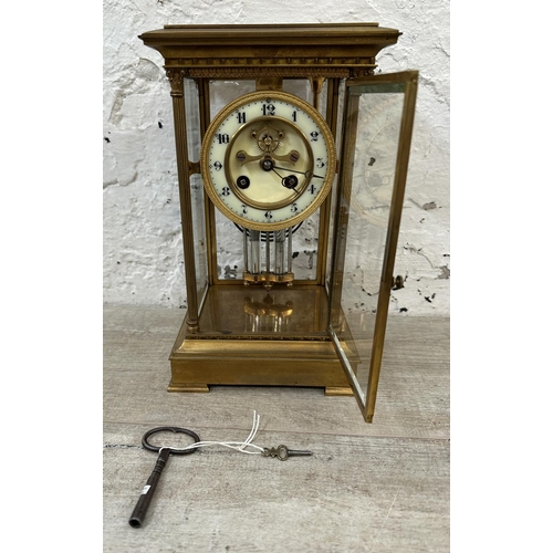 45 - A late 19th century French S. Marti gilt brass four glass mantel clock with enamel face, key and pen... 