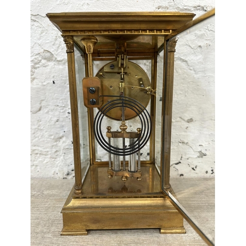 45 - A late 19th century French S. Marti gilt brass four glass mantel clock with enamel face, key and pen... 