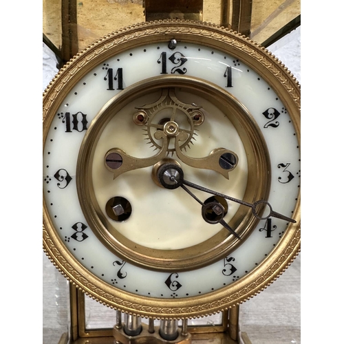 45 - A late 19th century French S. Marti gilt brass four glass mantel clock with enamel face, key and pen... 