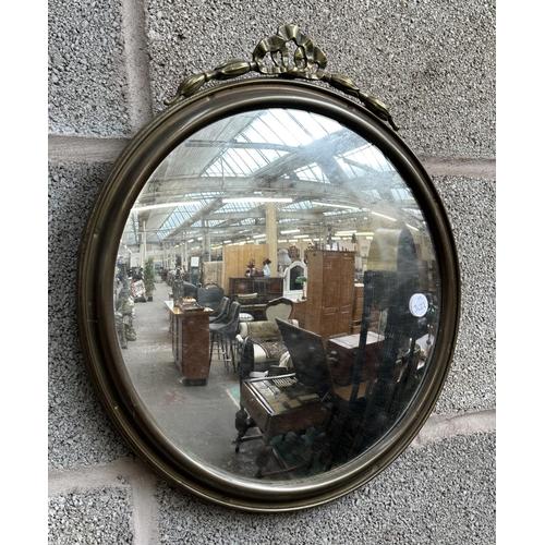 47 - Two brass framed convex wall mirrors - largest approx. 33cm diameter