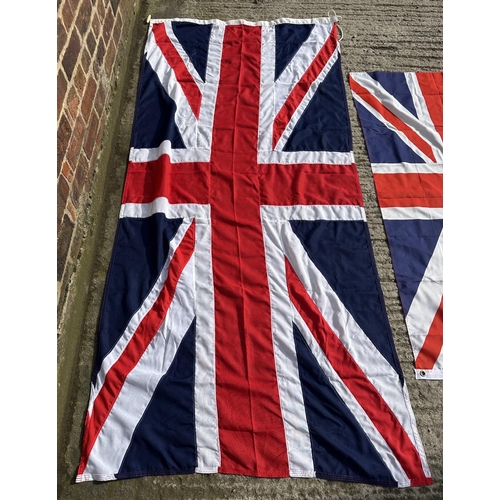 50 - Three items, one length of The Queen's Platinum Jubilee bunting and two Union Jack flags - largest a... 