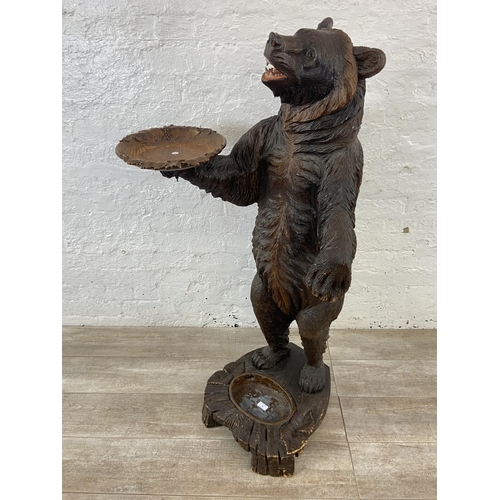 56 - A late 19th/early 20th century Black Forest carved wooden bear free standing umbrella stick stand - ... 