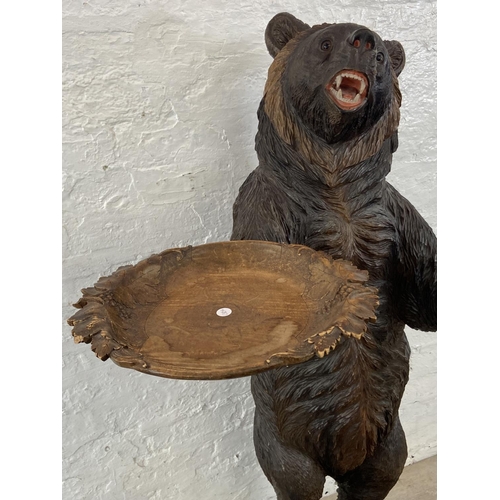 56 - A late 19th/early 20th century Black Forest carved wooden bear free standing umbrella stick stand - ... 